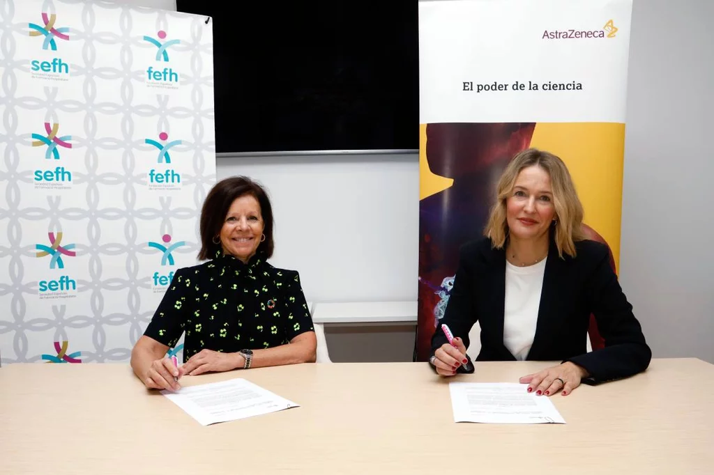 Olga Delgado y Marta Moreno, durante la firma del convenio entre la SEFH y AstraZeneca. Foto: SEFH.