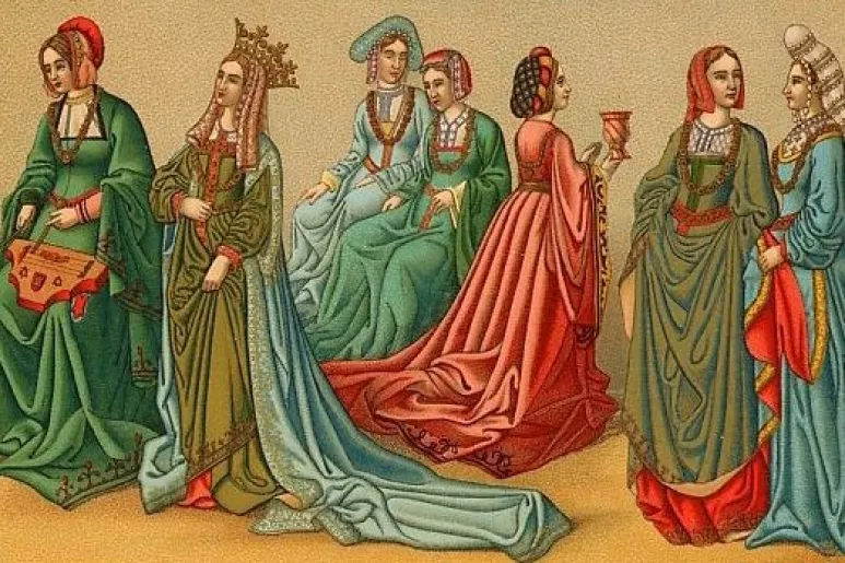 Damas elegantes ataviadas a la moda medieval.